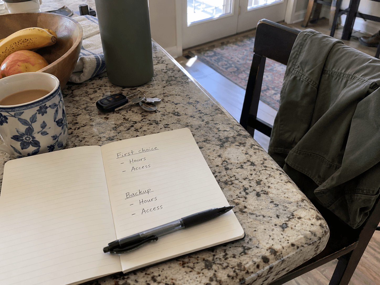 A pocket notebook with blank fields for a first facility choice, a backup, hours and access details.